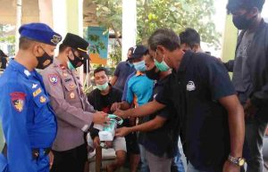 2.600 Masker Medis Gratis Dibagikan Polres Kep Seribu bersama Tiga Pilar