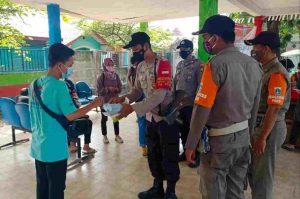 2.100 Masker Medis Gratis Dibagikan Polres Kep Seribu bersama Tiga Pilar