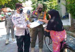 Cegah Sebaran Covid-19, Polres Ke Seribu Terus Himbau dan Bagikan 1.400 Masker ke Warga