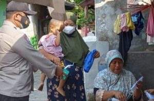Sembari Bagikan 1.400 Masker, Polres Kep Seribu Himbau ProKes 5M