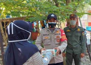 Saat Bagikan 1.400 Masker ke Warga Polres Kep Seribu Himbau ProKes