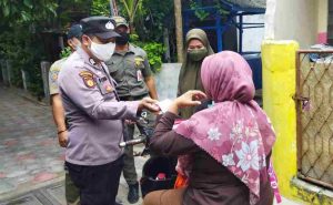 Cegah COVID-19, Polres Kep Terus Himbau ProKes dan Bagikan 1.000 Masker Ke Warga
