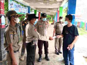 Bagikan 900 Masker ke Warga Polres Kep Seribu sampaikan Imbauan Taat ProKes