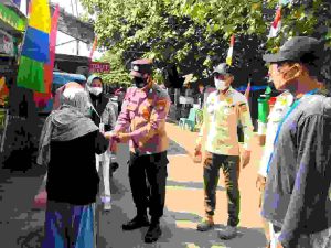 Bagikan 1.000 Masker ke Warga Polres Kep Seribu sampaikan Imbauan Taat ProKes